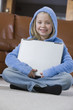 Photo: Girl holding her laptop Girl holding her laptop