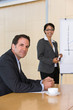 confident business woman giving presentation