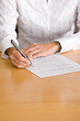 Foto: Taking notes at a meeting Taking notes at a meeting