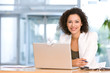 Attractive business woman working on laptop Attractive business woman working on laptop