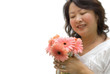 Lady with pink gerbera