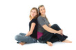 Mother and Dauther sit on the Floor