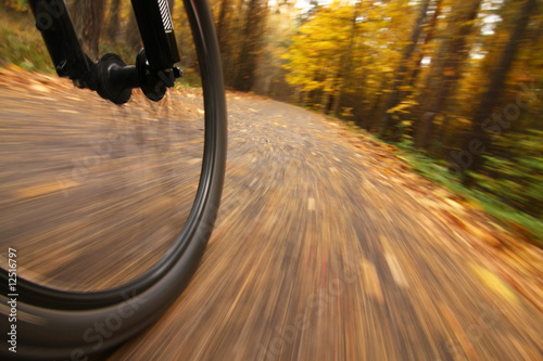 Photo: Bicycle riding, low angle motion blur Bicycle riding, low angle motion blur
