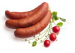 Smoked sausages decorated with tomatoes, onion, pepper Smoked sausages decorated with tomatoes, onion, pepper
