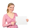 Foto: smiling blonde pointing on empty card smiling blonde pointing on empty card