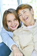 Granddaughter visiting grandmother