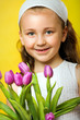 smiling beautiful  young girl with flowers at spring