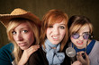 Three Young Girls with Microphone Making Faces