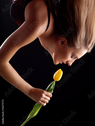 Photo: woman and yellow tulip woman and yellow tulip