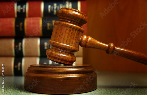 Photo: Judges gavel and law books stacked behind Judges gavel and law books stacked behind