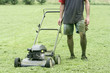 lawn mower and gardener