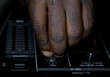 Hand of the dj on the mixer Hand of the dj on the mixer
