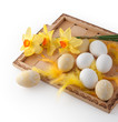 Easter eggs on a tray with flowers