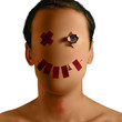 young male with paper skin and red tape