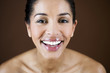 Close-up portrait of young woman, smiling
