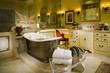 Master Bathroom with Bathtub on Marble Platform