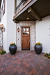Front Door under Balcony of House