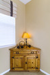 Wooden Corner Cabinet with Black Hardware