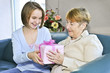 Granddaughter visiting grandmother