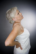 A senior woman with backache