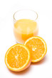 Glass of orange juice with a halved orange Glass of orange juice with a halved orange