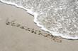 message dans le sable