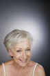 Photo: A senior woman smiling A senior woman smiling