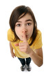Young girl with her finger on her mouth Young girl with her finger on her mouth