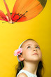 smiling beautiful  young girl with a butterfly at spring