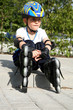 Child with roller skates.
