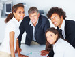 Group of happy business people working together