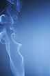 Photo: White Smoke on Spot Lit Blue Background White Smoke on Spot Lit Blue Background