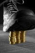 treading three coins columns with a boot