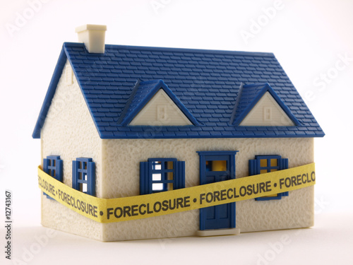 Photo: House with Foreclosure tape House with Foreclosure tape