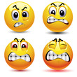 Smiling balls with different face expression of anger
