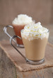 Coffee Latte and Hot Chocolate with thick cream on old wooden Coffee Latte and Hot Chocolate with thick cream on old wooden