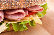 whole wheat baguette sandwich with lettuce, tomatoes and ham whole wheat baguette sandwich with lettuce, tomatoes and ham
