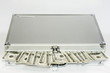 metal briefcase with money dollars isolated