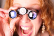 astonished woman with binoculars