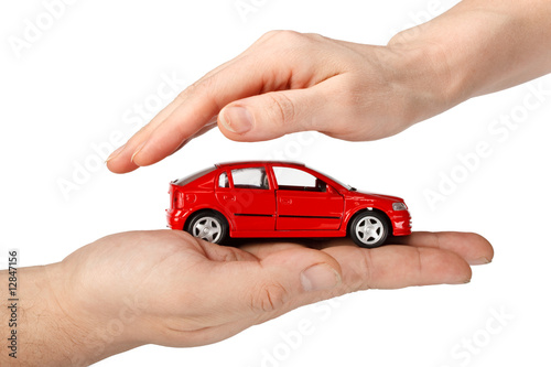 Red car in hands