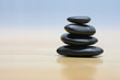 Zen stones on wooden surface