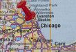 red push pin pointing on chicago