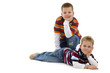Young boys lying on floor