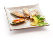 Mussel with lemon slice and parsley on the squared plate