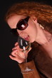 woman drinking wine - retro style
