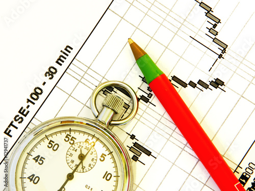 Photo: business diagram and watch-stopwatch business diagram and watch-stopwatch