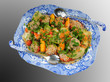 Staffing vegetables with kitchen ware