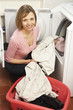 Photo: Woman Doing Laundry Woman Doing Laundry