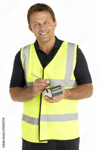 Photo: Courier Writing On An Electronic Clipboard, Smiling Courier Writing On An Electronic Clipboard, Smiling