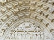 Carved stone lintel on a church door in France Carved stone lintel on a church door in France